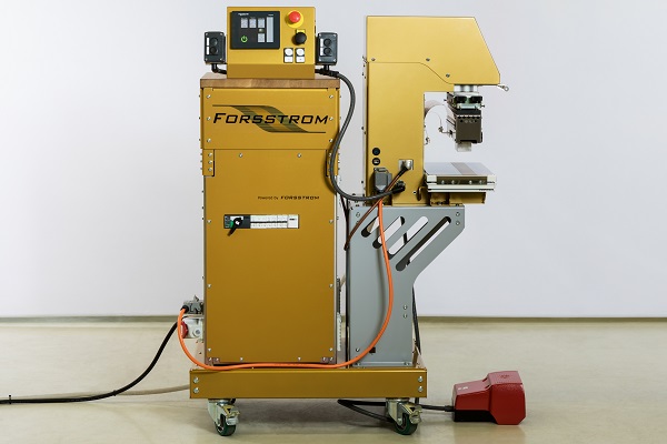 This is a photo showing Forsstrom's generator FG 120 with the table press TP.