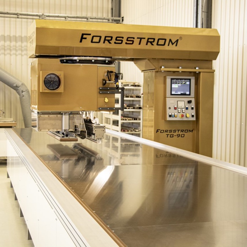 This is a photo of a table on Forsstrom's machine model TG-90 Mega